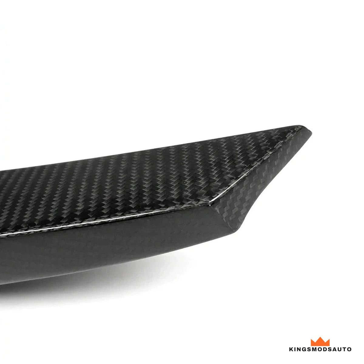 Close-up of the gloss 3K twill dry carbon weave on the trunk spoiler
