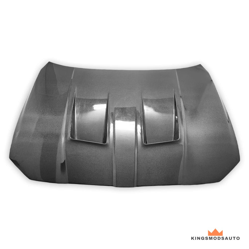 Carbon fiber vented hood for the BMW G80 M3 and G82 M4, top view showing the twin heat-extraction vents