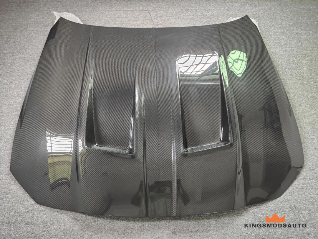 Top surface of the carbon fiber hood with gloss clear coat