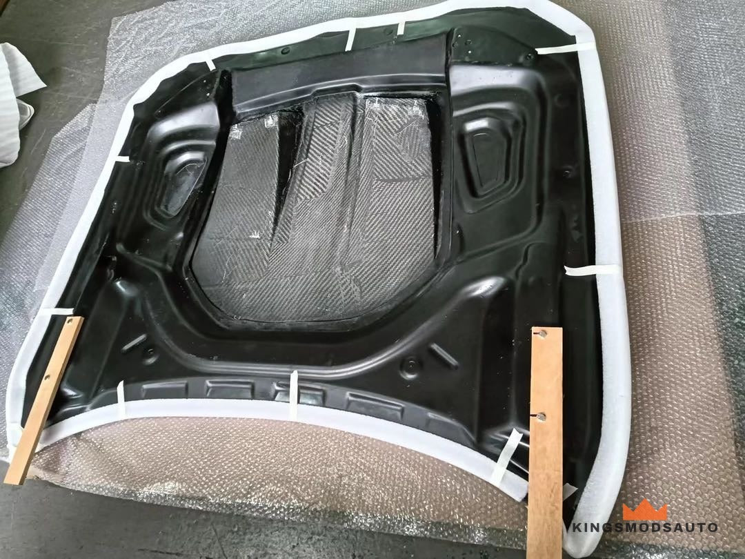 Underside of the hood in its protective packing, ready for freight
